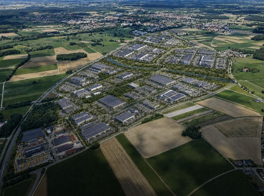 Luftbildvisualisierung des geplanten Gewerbeparks mit Hallen, Grünzügen und Erschließungsstraßen